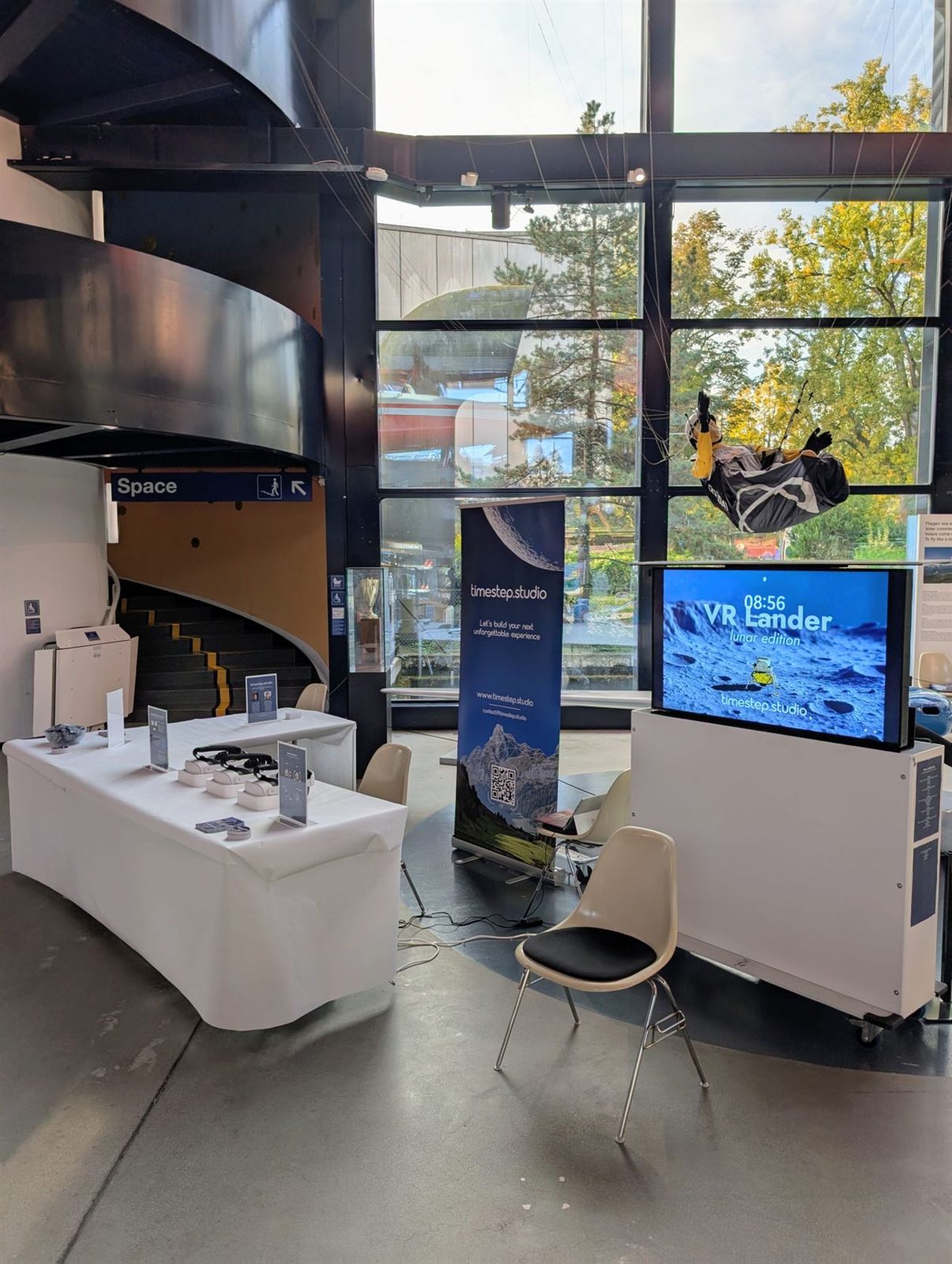 The VR Lander stand in a glass-walled hall at the Swiss Museum of Transport.